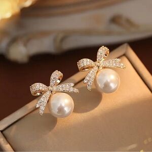 Elegant Gold Pearl Bow Earrings